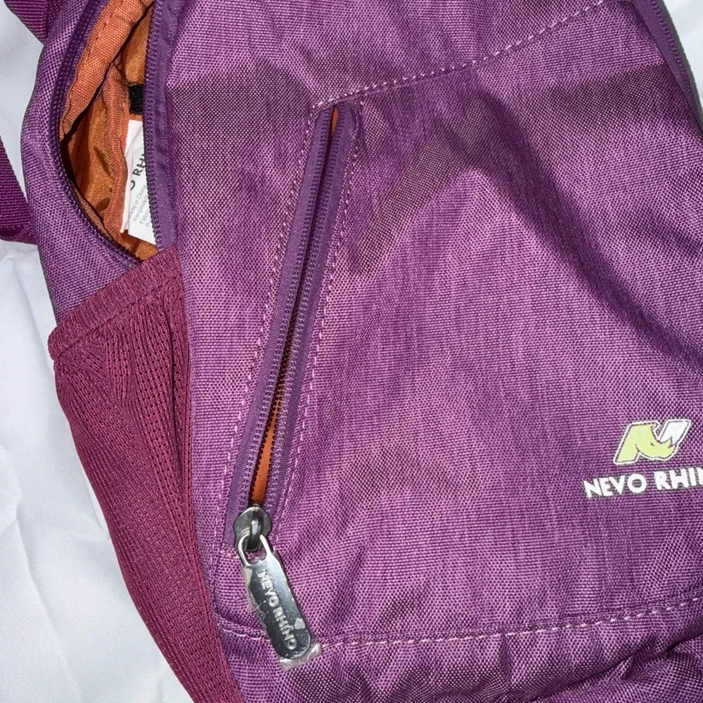 Nevo Rhino Sling Crossbody Bag Back Pack Backpack New W/O Tags Purple or Pink